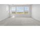Spacious bedroom featuring ample natural light and carpet at 3391 N Buchanan Way, Aurora, CO 80019