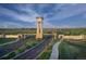 Grand entrance to The Aurora Highlands with clock tower at 3391 N Buchanan Way, Aurora, CO 80019