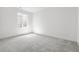 Finished basement bedroom with carpet and a window at 3391 N Buchanan Way, Aurora, CO 80019