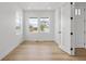 Bright and spacious office with hardwood floors and large windows at 3391 N Buchanan Way, Aurora, CO 80019