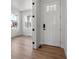 Bright entryway with hardwood floors and white door at 3391 N Buchanan Way, Aurora, CO 80019