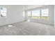 Bright and airy bedroom with large windows and carpet at 3391 N Buchanan Way, Aurora, CO 80019