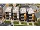 Aerial view of four modern townhomes with city views at 1262 N Stuart St # 2, Denver, CO 80204
