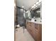 Modern bathroom with double vanity and glass shower at 1262 N Stuart St # 2, Denver, CO 80204