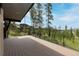 Spacious deck with mountain views and black railings at 245 Fairways Dr, Breckenridge, CO 80424