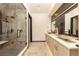 Modern bathroom with double vanity and large walk-in shower at 245 Fairways Dr, Breckenridge, CO 80424