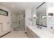 Modern bathroom with a walk-in shower and hexagon tile at 245 Fairways Dr, Breckenridge, CO 80424