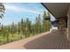 Large deck with mountain views and built-in grill at 245 Fairways Dr, Breckenridge, CO 80424
