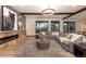 Spacious Gathering room with a cozy fireplace and ample seating at 245 Fairways Dr, Breckenridge, CO 80424