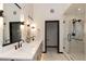 Elegant bathroom with a double vanity and walk-in shower at 245 Fairways Dr, Breckenridge, CO 80424