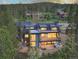 Luxury home with mountain views, deck, and hot tub; multiple levels and large windows at 245 Fairways Dr, Breckenridge, CO 80424