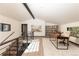 Bright home office with wood desk and views from large windows at 245 Fairways Dr, Breckenridge, CO 80424