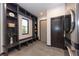 Laundry room with built-in shelving and a window at 245 Fairways Dr, Breckenridge, CO 80424