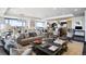 Modern living room with kitchen, dining, and seating areas. City views at 1133 14Th St # 2620, Denver, CO 80202