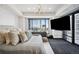Spacious bedroom with city views and large TV at 1133 14Th St # 2620, Denver, CO 80202