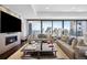 Spacious living room with floor-to-ceiling windows and city views at 1133 14Th St # 2620, Denver, CO 80202