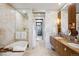 Spa-like bathroom with soaking tub and double vanity at 1133 14Th St # 2620, Denver, CO 80202