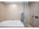 Modern bathroom with soaking tub and glass shower at 1133 14Th St # 2620, Denver, CO 80202