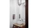 Modern powder room with glass bowl sink and marble vanity at 1133 14Th St # 2620, Denver, CO 80202