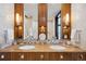 Modern bathroom with double vanity and wood cabinets at 1133 14Th St # 2620, Denver, CO 80202