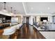 Open concept living and kitchen area with hardwood floors at 1133 14Th St # 2620, Denver, CO 80202