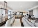 Open concept kitchen and dining area with modern appliances and city views at 1133 14Th St # 2620, Denver, CO 80202
