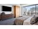 Bedroom with city views and built-in storage at 1133 14Th St # 2620, Denver, CO 80202