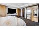Bedroom with large TV, closets and bathroom access at 1133 14Th St # 2620, Denver, CO 80202