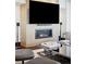 Modern fireplace with built-in media console at 1133 14Th St # 2620, Denver, CO 80202