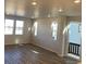 Spacious living room featuring hardwood floors and abundant natural light at 8826 Yellowcress St, Littleton, CO 80125