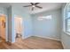 Bright bedroom with wood floors and en-suite bathroom at 1998 Foxtail Ln # B, Lafayette, CO 80026