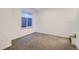 Finished basement bedroom with carpeted floors and large window at 1998 Foxtail Ln # B, Lafayette, CO 80026