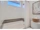 Clean bathroom with white tile and a bathtub at 1998 Foxtail Ln # B, Lafayette, CO 80026