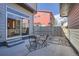 Private patio with small table and chairs, perfect for relaxing at 1998 Foxtail Ln # B, Lafayette, CO 80026
