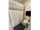 Clean bathroom with shower/tub combo at 10330 W Jewell Ave # A, Lakewood, CO 80232