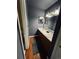 Double vanity bathroom with updated fixtures at 10330 W Jewell Ave # A, Lakewood, CO 80232