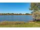 Scenic view of a calm river with lush green landscape at 10330 W Jewell Ave # A, Lakewood, CO 80232