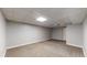 Unfinished basement with neutral carpeting at 7248 S Broadway, Centennial, CO 80122