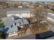 Aerial view of house, detached shop, and large lot at 12140 E 116Th Cir, Henderson, CO 80640