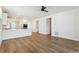 Spacious living room with hardwood floors and ceiling fan at 42996 Colonial Trl, Elizabeth, CO 80107
