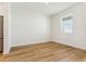 Bright dining room with hardwood floors and large window at 42996 Colonial Trl, Elizabeth, CO 80107