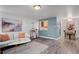 Bright living room with light walls and hardwood floors at 1260 York St # 105, Denver, CO 80206
