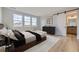 Spacious bedroom with large windows and en-suite bathroom at 11076 Star Fall St, Littleton, CO 80125