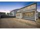 Large backyard with a patio and view of neighboring homes at 11076 Star Fall St, Littleton, CO 80125