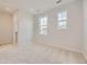 Spacious bedroom with neutral walls and carpet flooring at 11076 Star Fall St, Littleton, CO 80125