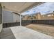 Covered patio overlooking the backyard and under-construction homes at 11076 Star Fall St, Littleton, CO 80125