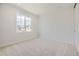 Simple bedroom with neutral walls and carpet flooring at 11076 Star Fall St, Littleton, CO 80125