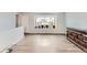 Living room with hardwood floors and large window at 9132 Fayette St, Denver, CO 80260