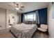 Spacious main bedroom with plush carpet, large window, and en-suite bathroom at 5724 S Bahama W Cir, Aurora, CO 80015