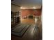 Living room with hardwood floors, fireplace and ample natural light at 1515 S Monaco Pkwy, Denver, CO 80224
